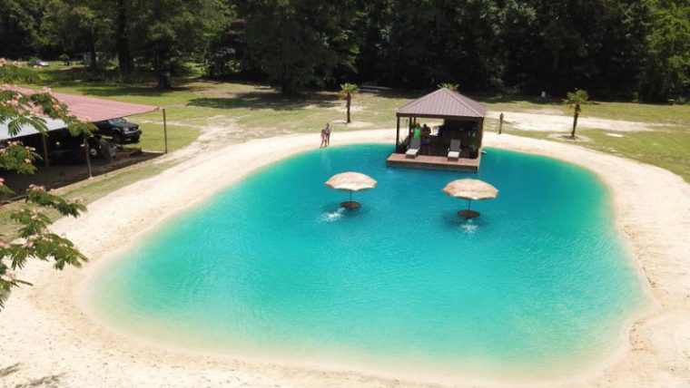 Homeless Man Builds Backyard Beaches For People, Becomes Millionaire - Featured image
