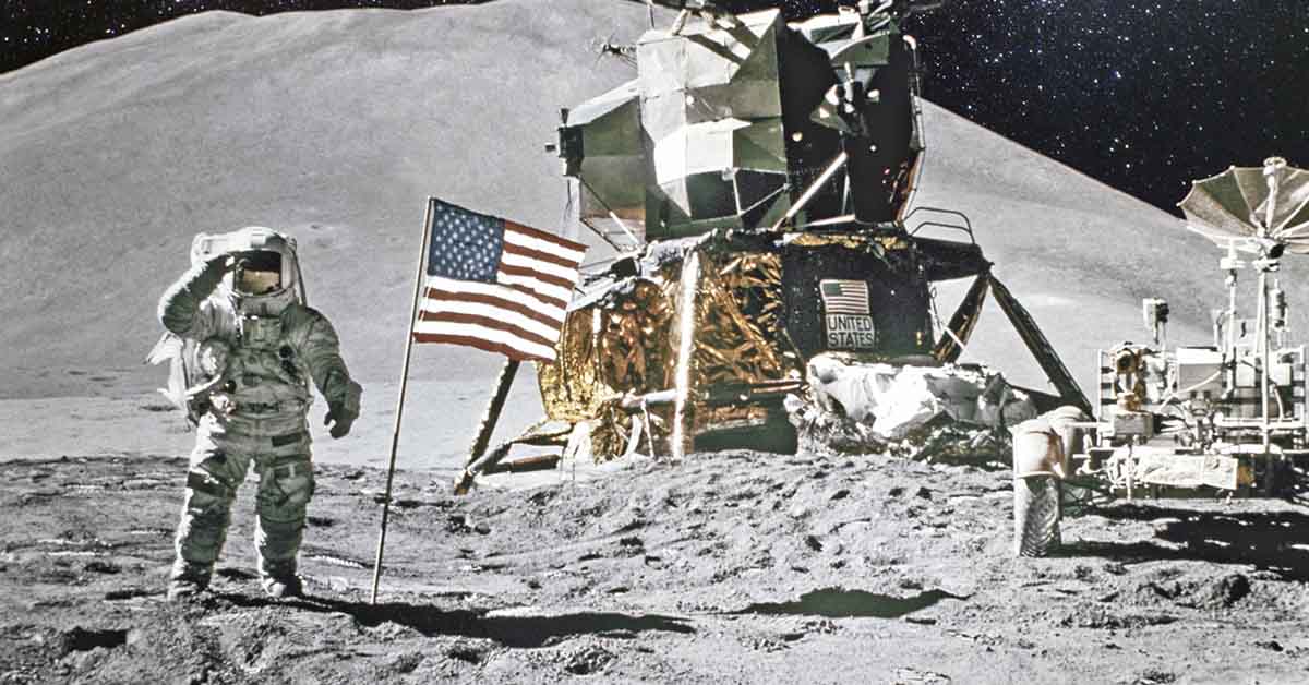 Astronaut on moon, with moon lander in background