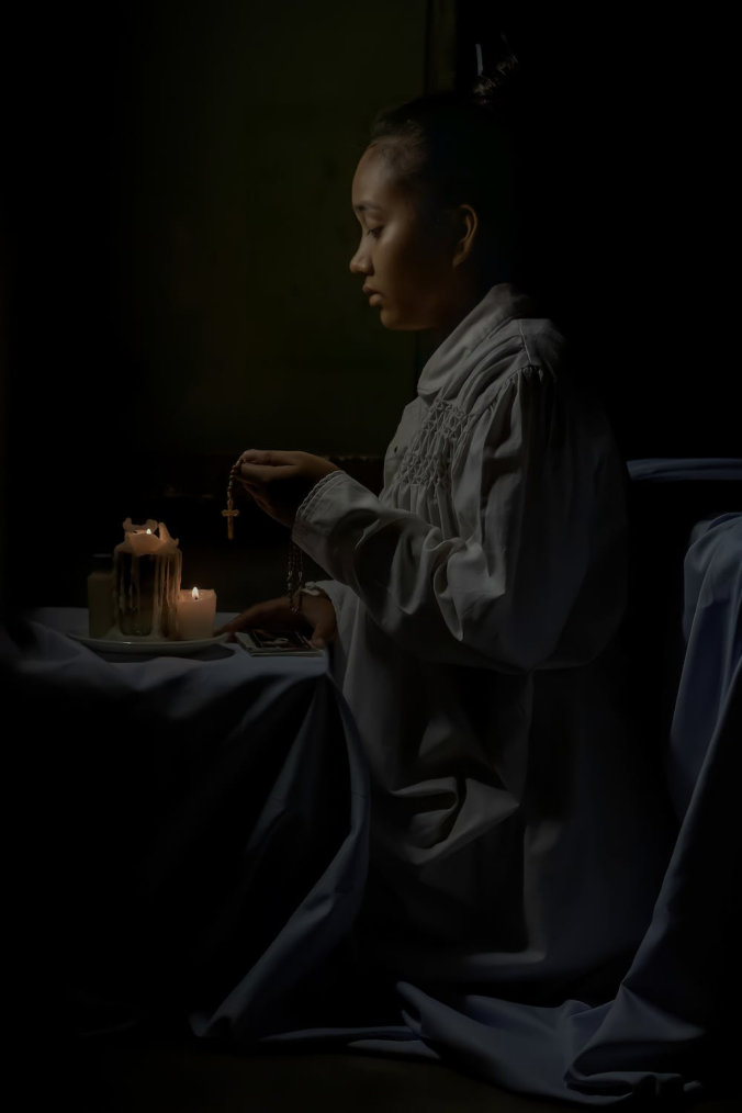 Woman praying at night