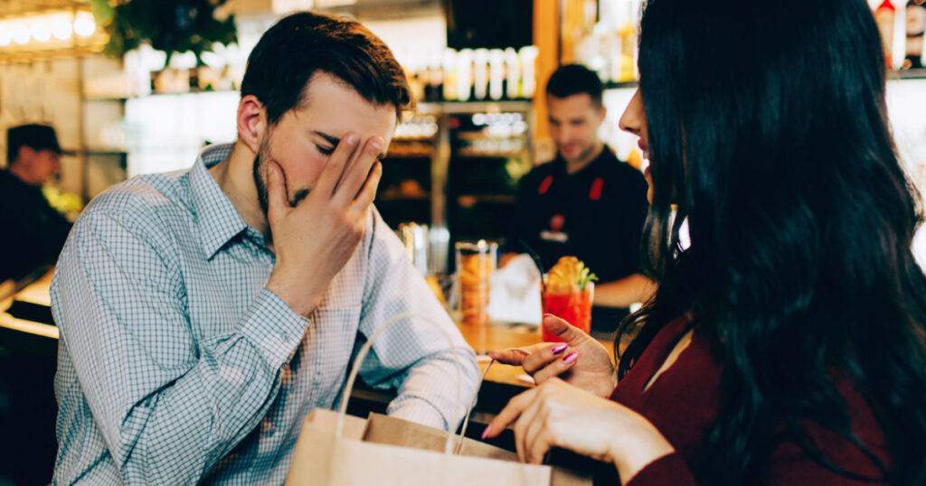 Sad picture of man covering hie face with the hand