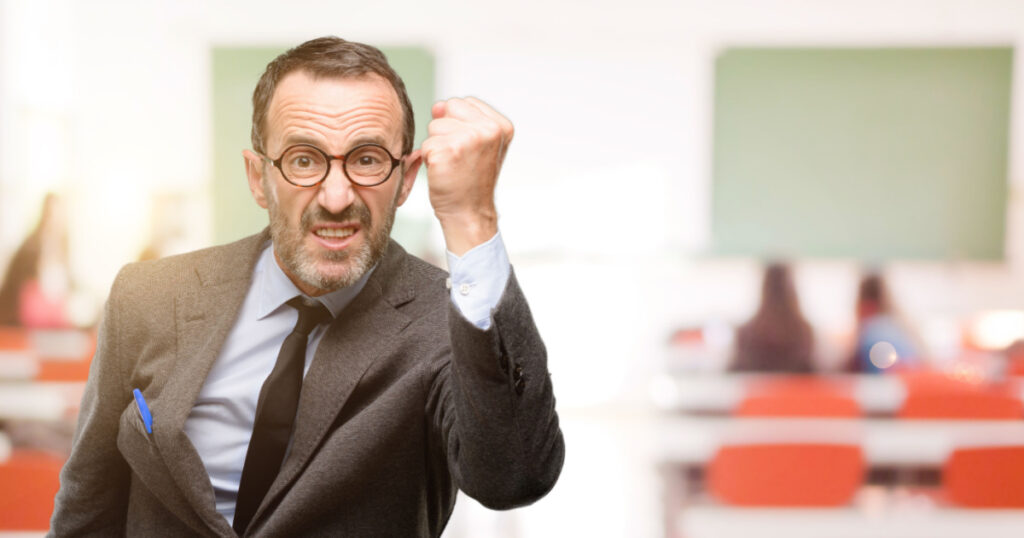 Teacher man using glasses irritated and angry expressing negative emotion