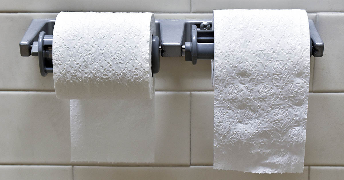 two rolls of toilet paper placed in over and under position