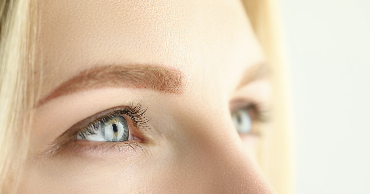 close up of blond woman's blue eyes