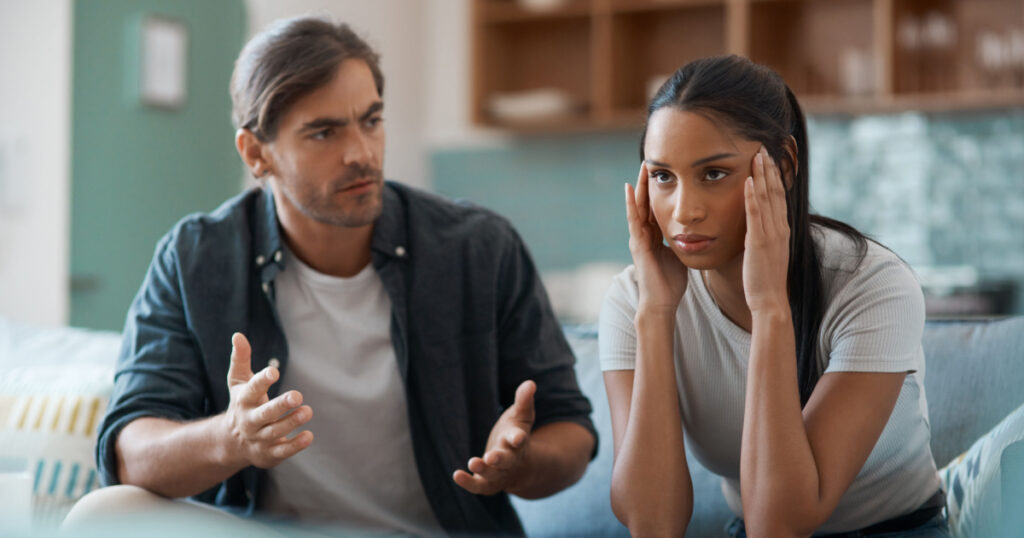 dont want to talk right now. Shot of a young couple having an argument at home.
