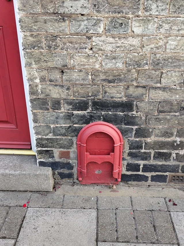 Mysterious hatch outside UK buildings