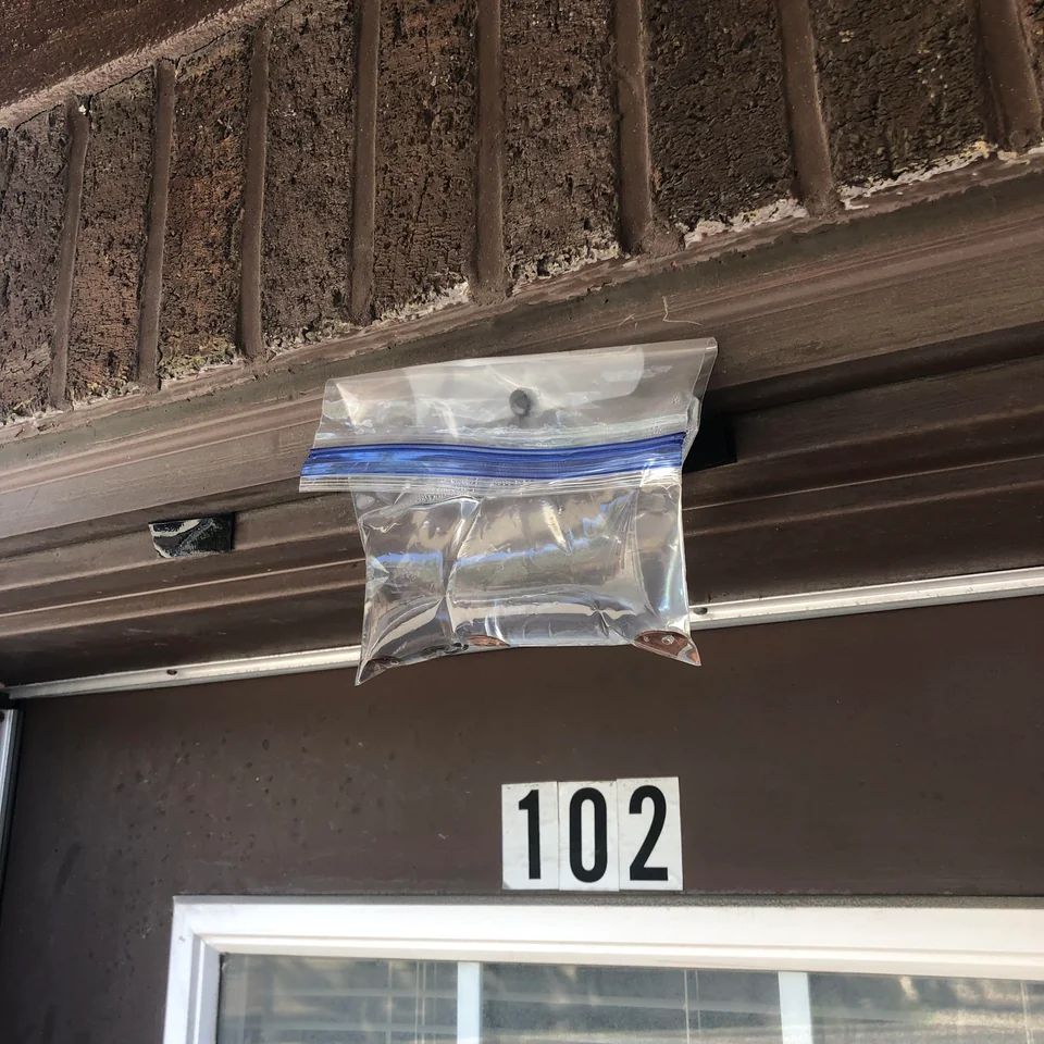 A plastic bag with a bit of water.