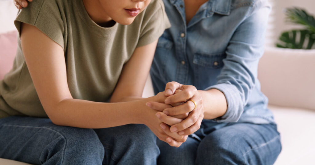 mother speaking to child