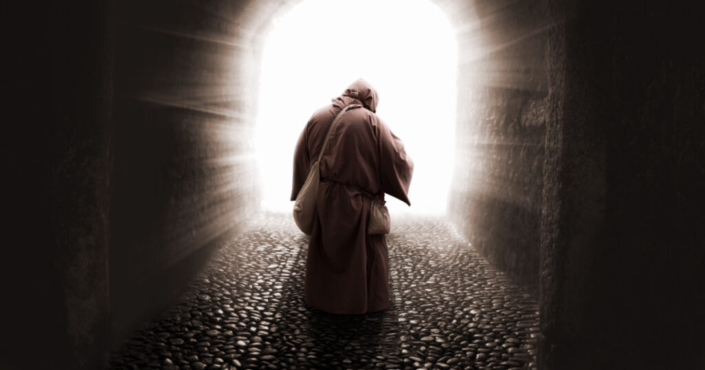 blissed Friar with faith on god walking toward the light
