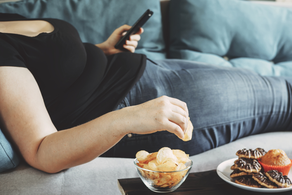 obese woman on couch