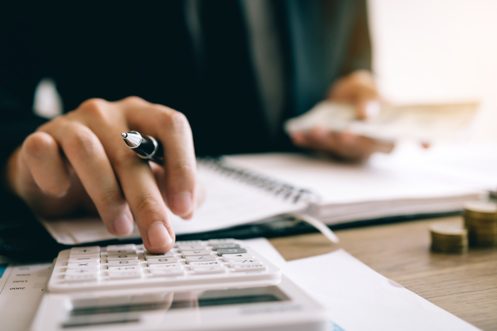 investing, calculator, notepad