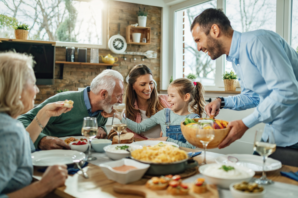 family gathering around meal