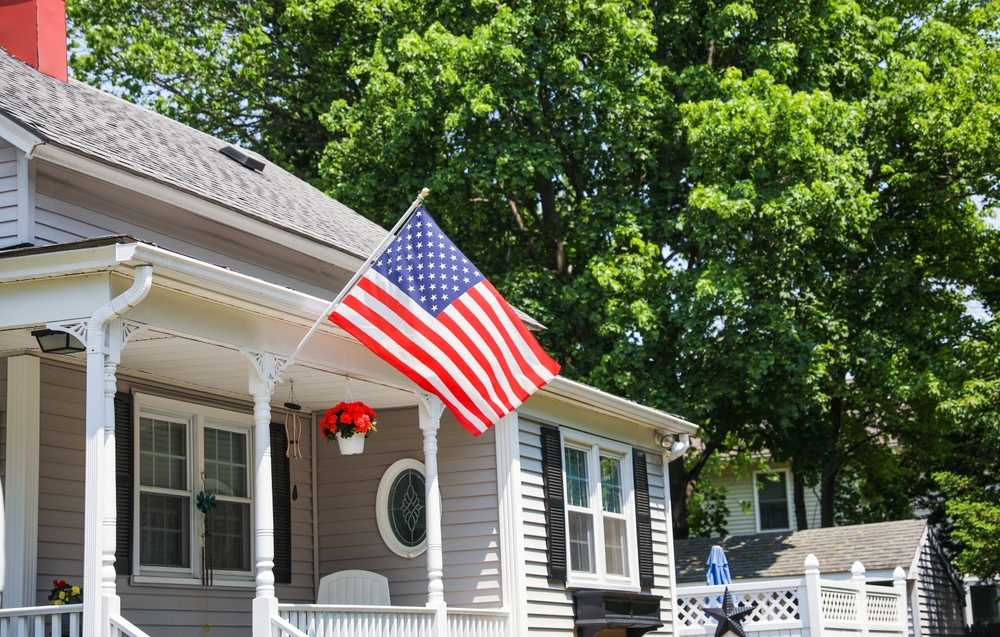 older home with flag out front