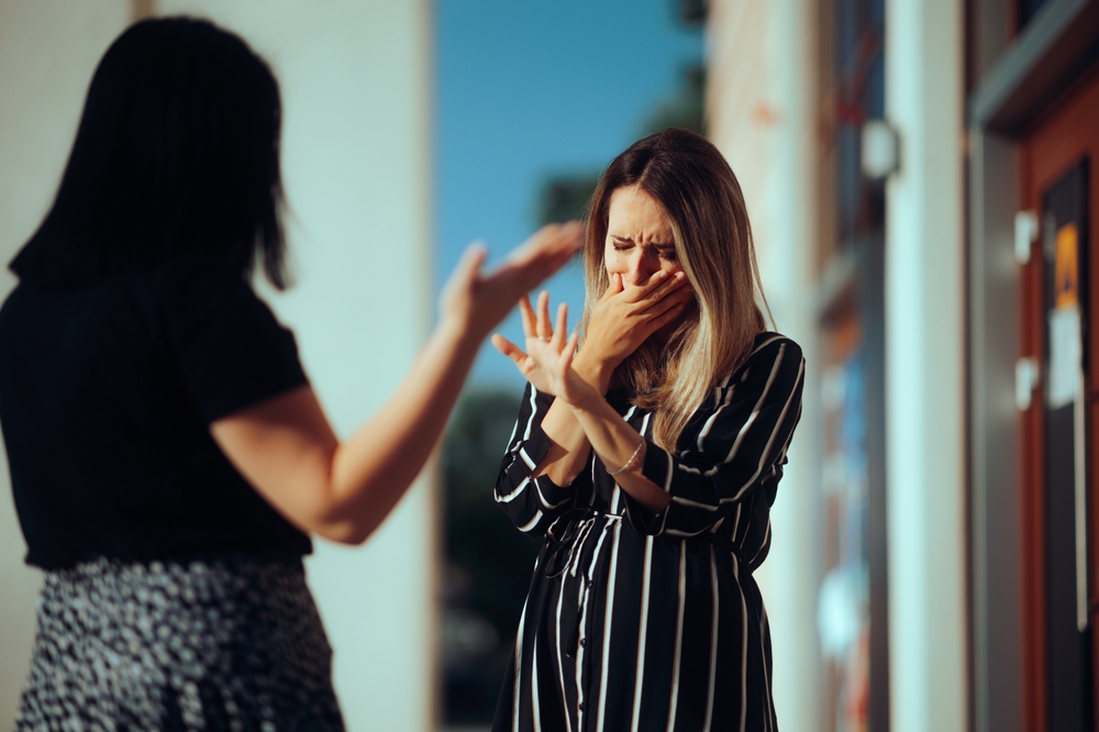 unhappy women talking
