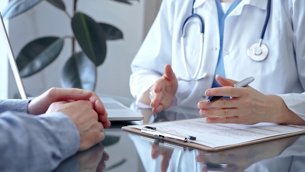 doctor talking to patient