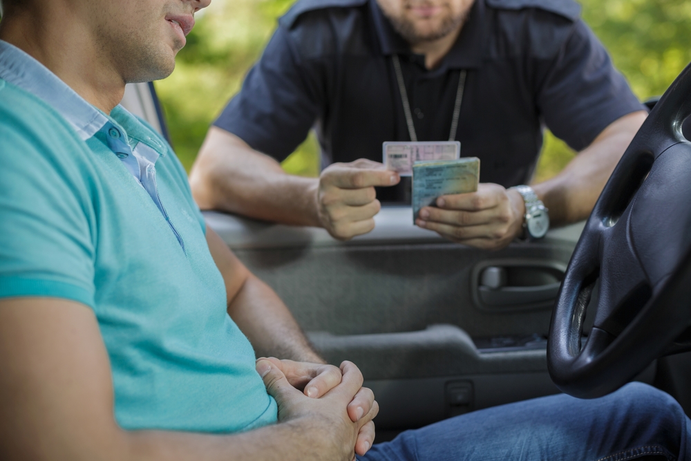 police officer pulled over immigrant to check for legal status