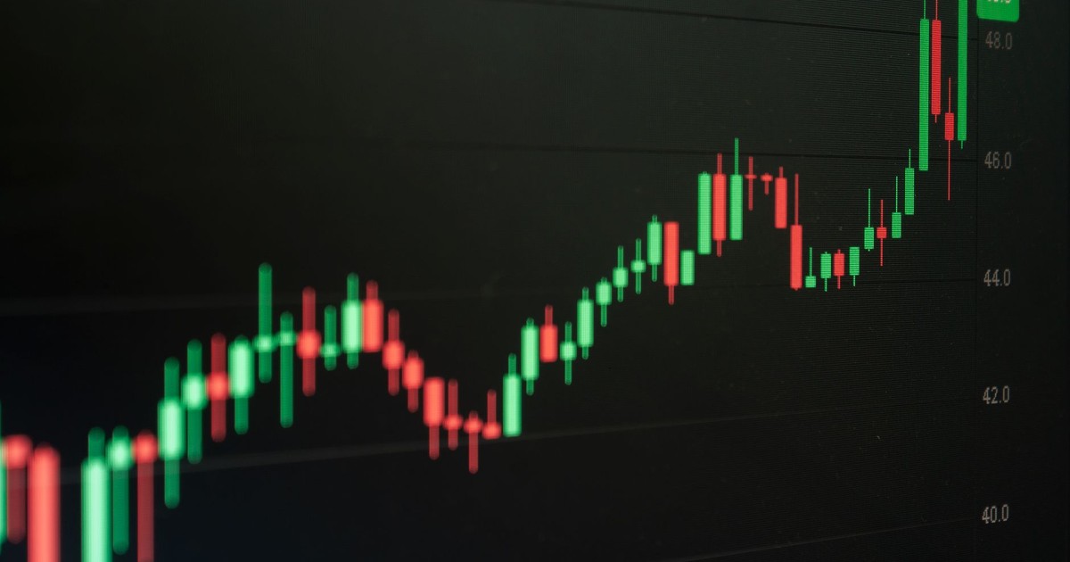 Close-up of a digital candlestick chart indicating bullish market trends in trading.