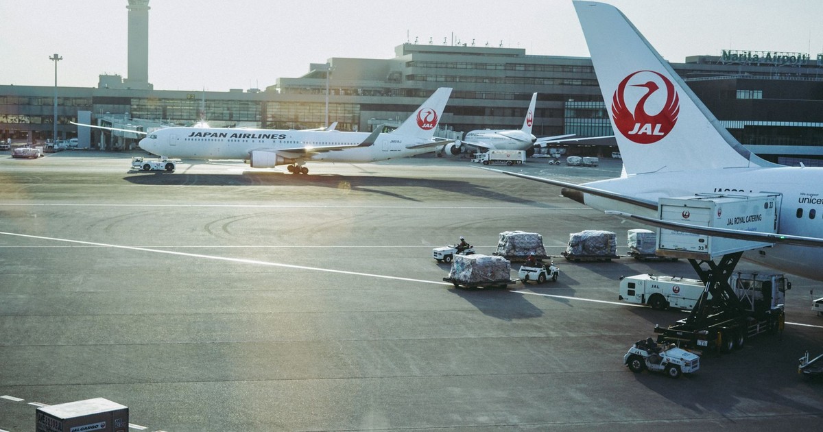 Japan Airlines planes on the tarmac at Narita International Airport in Chiba, Japan.