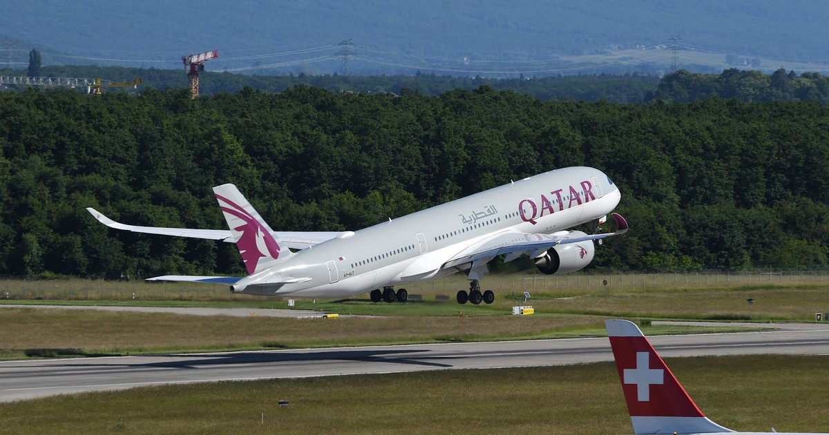 Qatar Airways aircraft taking off at Geneva Airport with Swiss scenery in the background.