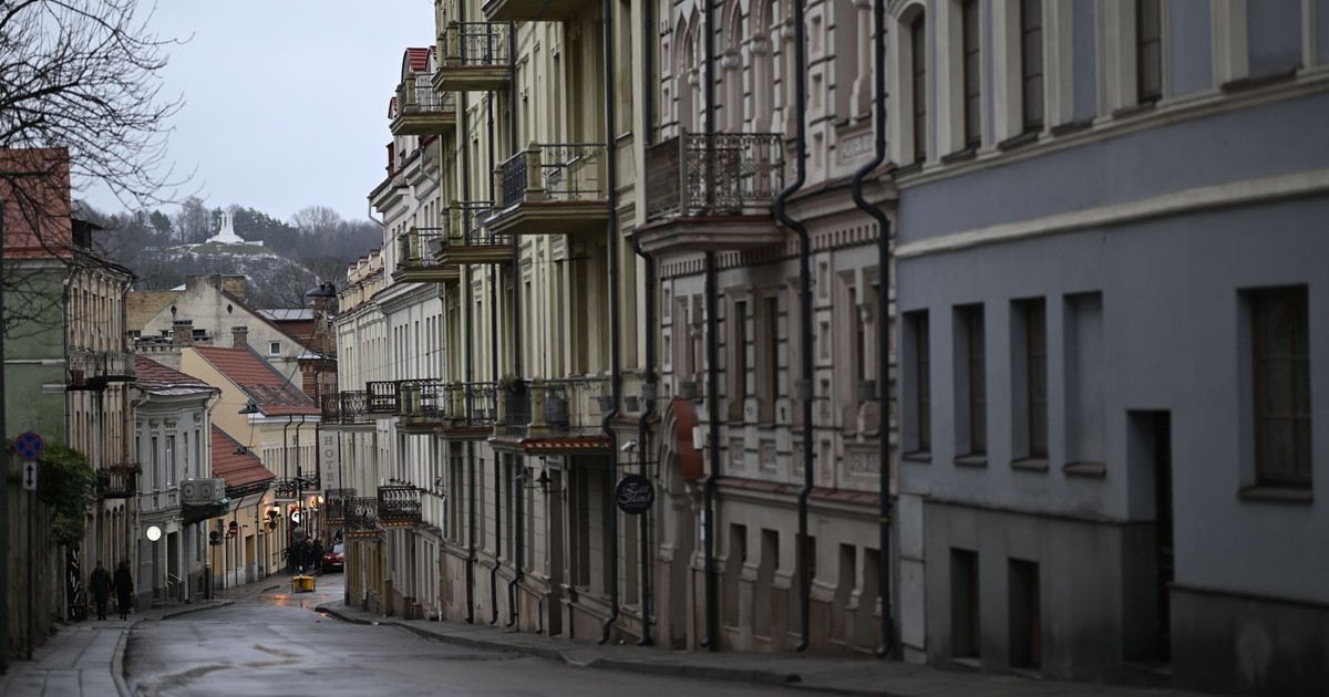 Elegant street view of historical townhouses in Vilnius' Old Town, Lithuania.