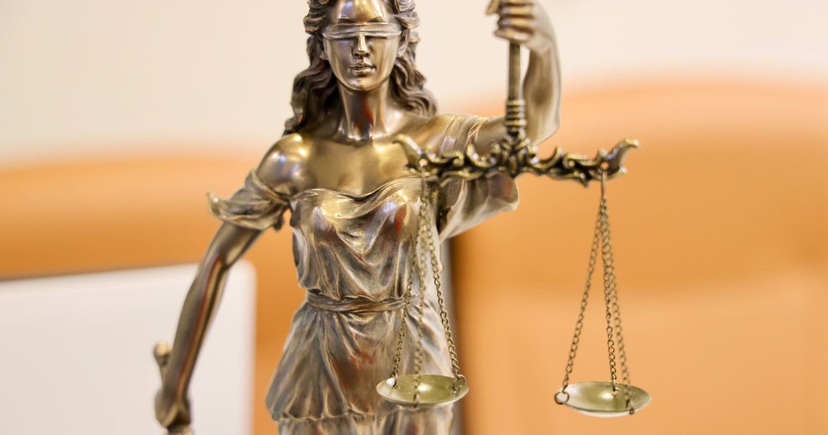Detailed image of Lady Justice statue, symbolizing fairness and impartiality.