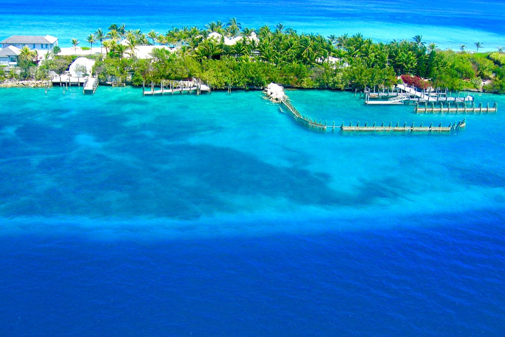A breathtaking aerial view of Nassau, Bahamas showcasing vibrant blue waters and lush greenery