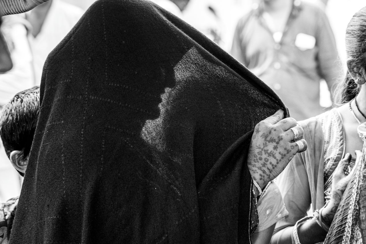 widow in black veil