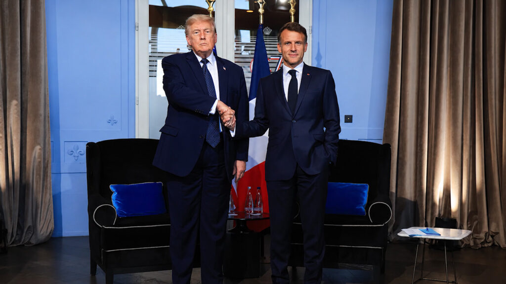 Trump Just Did The Strange Handshake Thing (Twice) With the Macrons at G7 - Featured image
