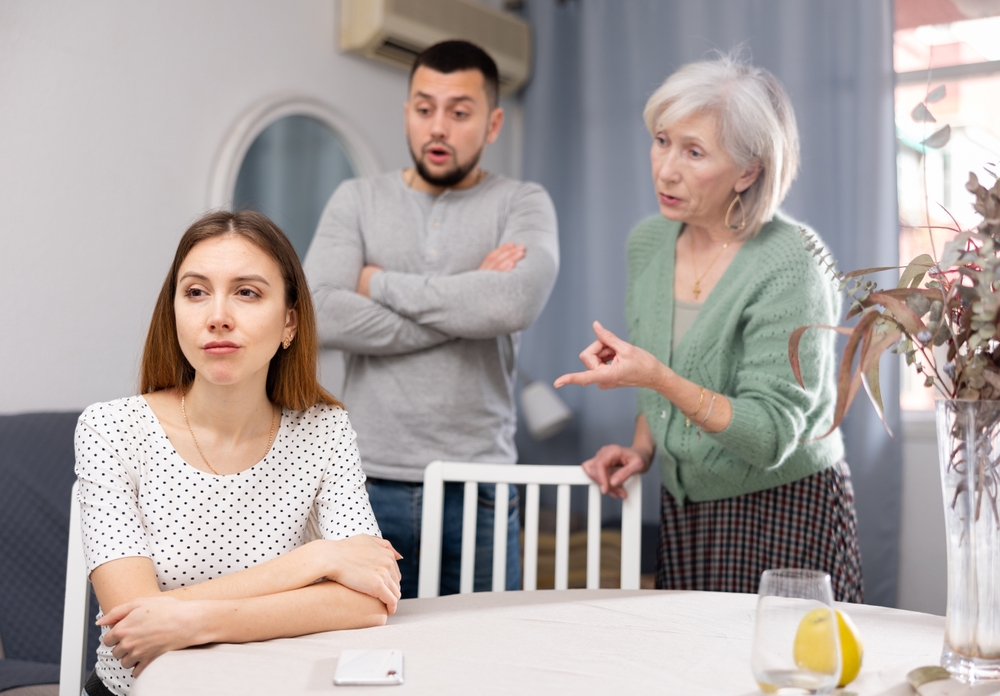 woman yelling at younger woman
