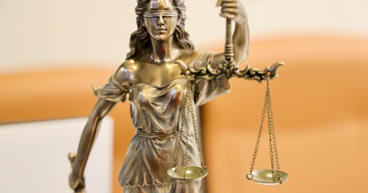 Detailed image of Lady Justice statue, symbolizing fairness and impartiality.