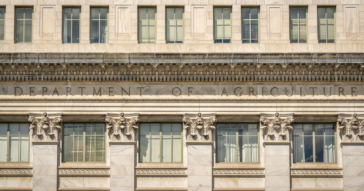 Close-up of the Department of Agriculture building's architectural facade, showcasing intricate columns and windows.
