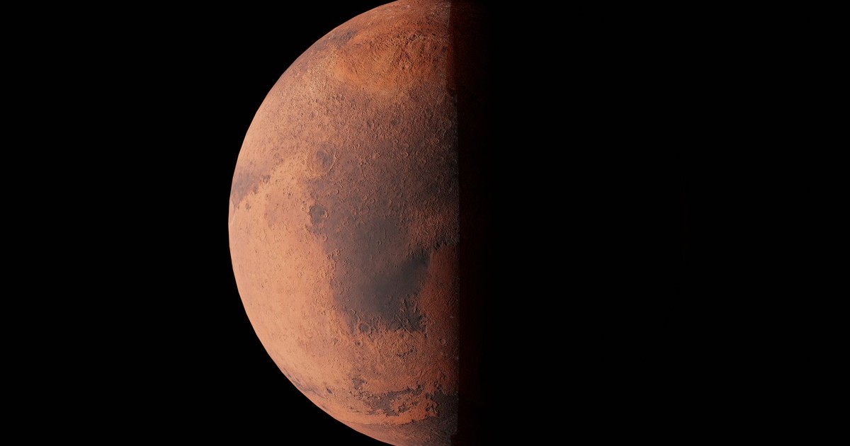 Stunning image of Mars half-illuminated against the blackness of space.