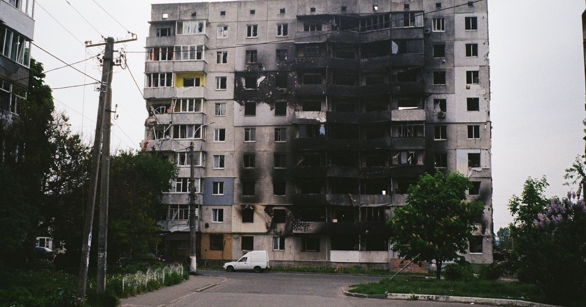 A heavily damaged apartment building in Borodyanka, Ukraine, illustrating urban devastation.