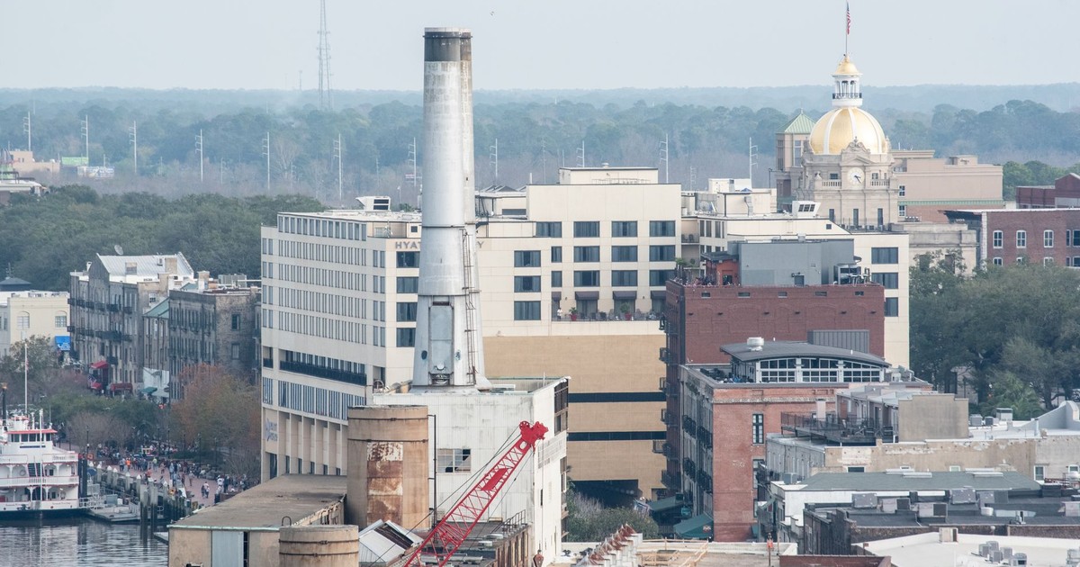 Aerial view of Savannah, Georgia showing historic buildings and cityscape.