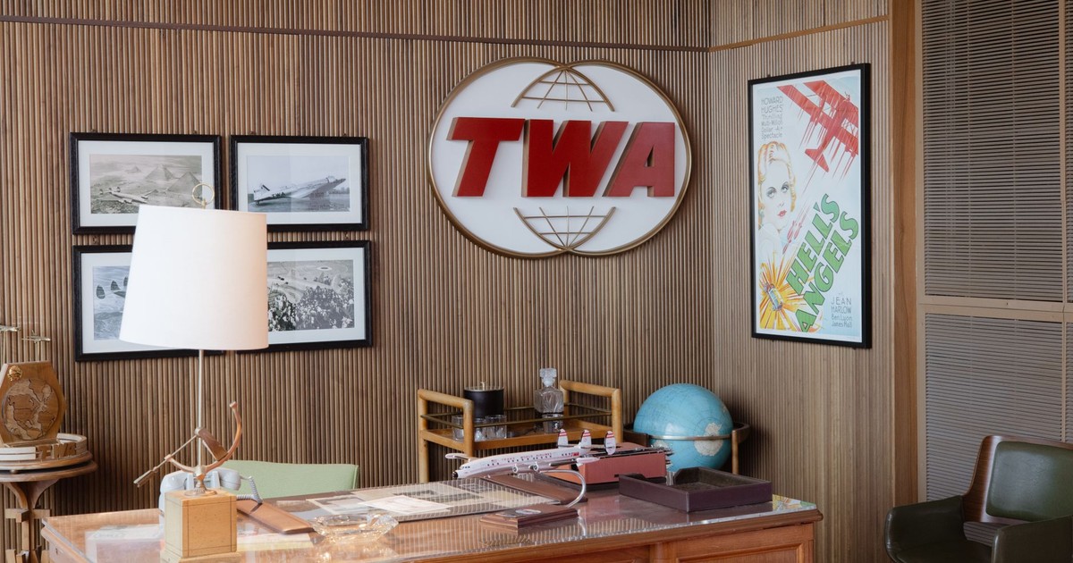 Retro TWA office design featuring vintage decor and aviation memorabilia at JFK Airport.