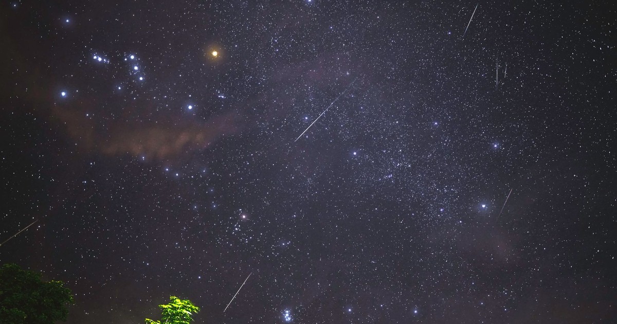Captivating view of a meteor shower with bright stars over Malita, Philippines, highlighting the night sky beauty.