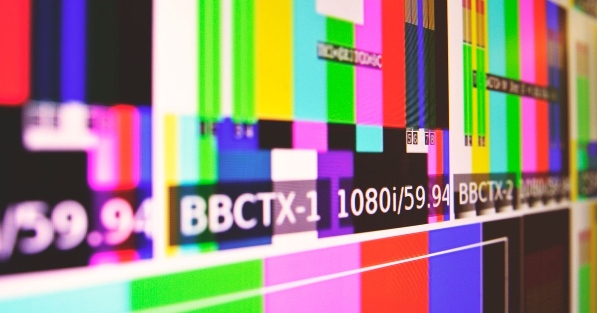 Vibrant test pattern screen with colorful bars and modern design.