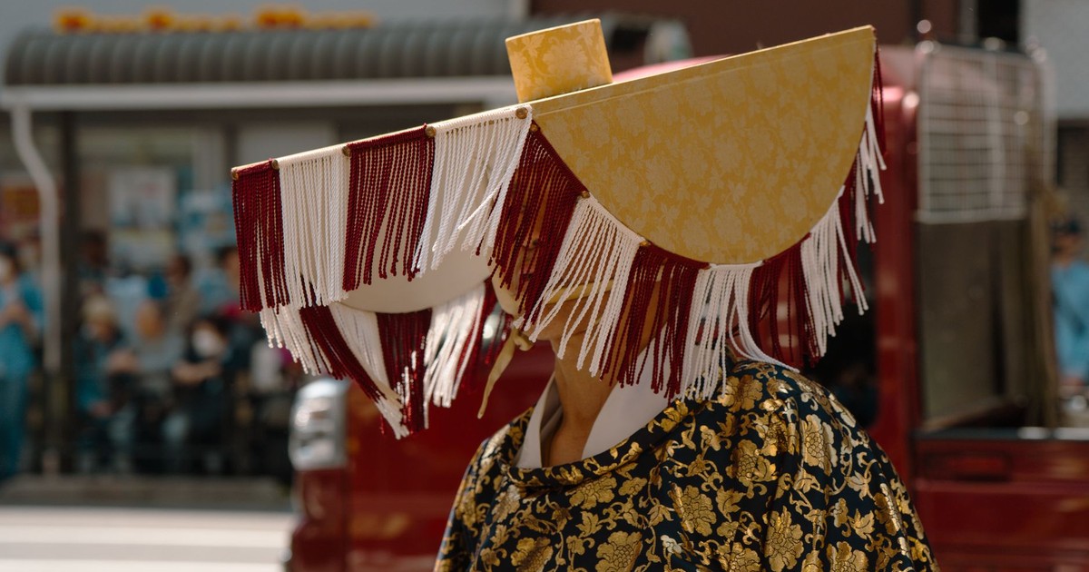 A vibrant and ornate traditional costume worn during a festival in Tokyo, Japan.