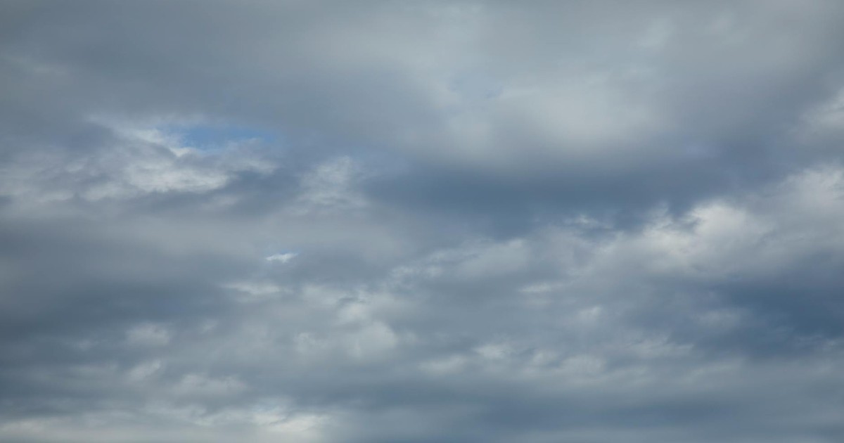 Overcast sky with thick clouds creating a dramatic and moody atmosphere.