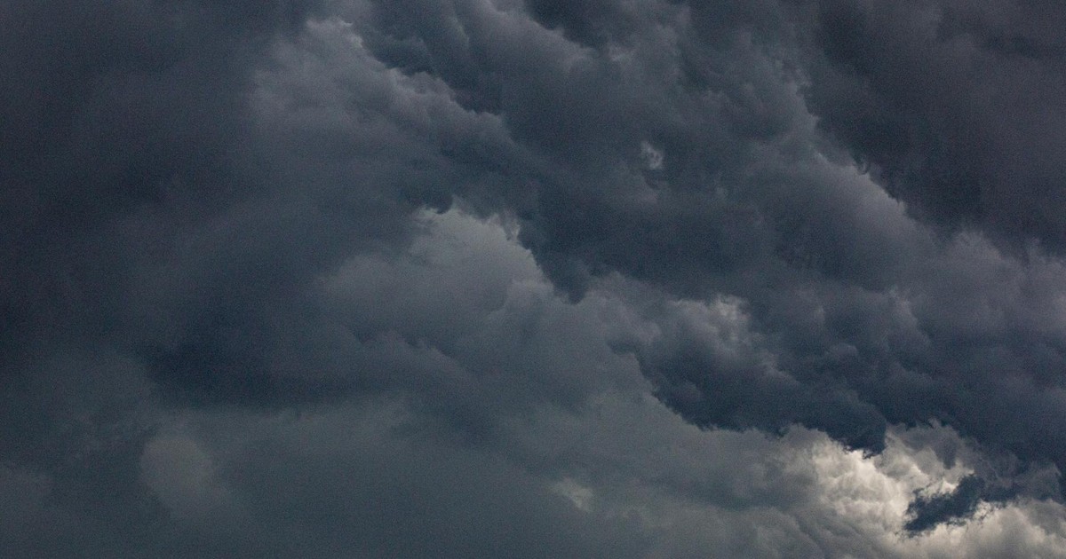 Moody sky filled with dense, dark clouds representing a dramatic atmosphere.