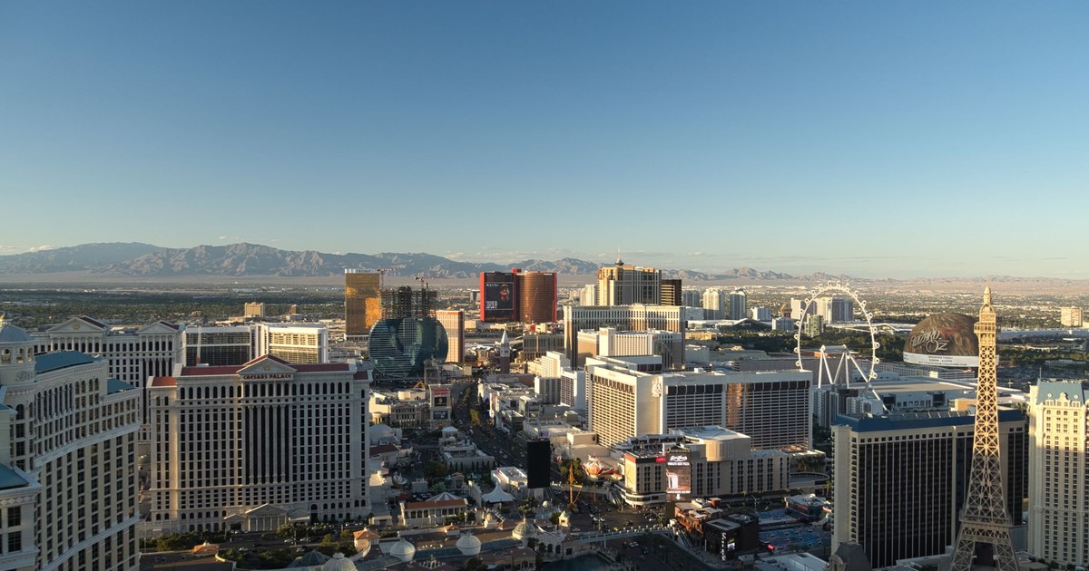Stunning Las Vegas skyline at daybreak showcasing notable casinos and landmarks.