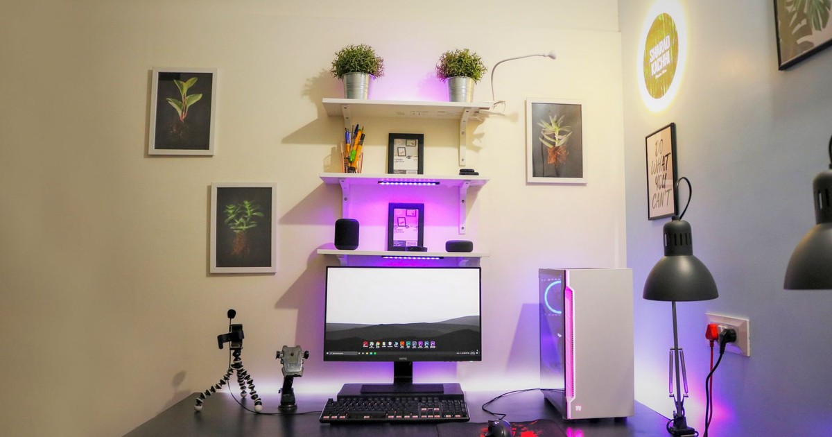 Minimalist home office setup with modern tech, ideal for creative and organized workspaces.