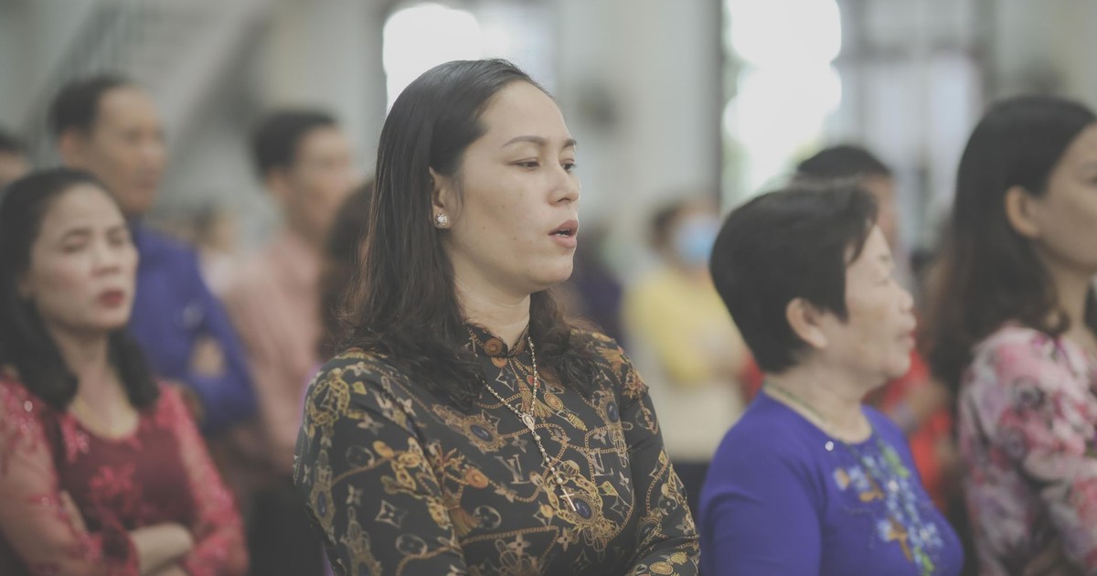 A group of people attentively participating in a church service, embodying community and faith.