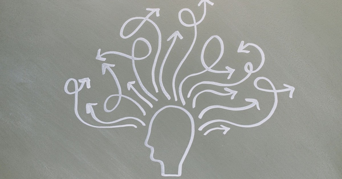 Conceptual chalk drawing illustrating mental health challenges with arrows representing thoughts.