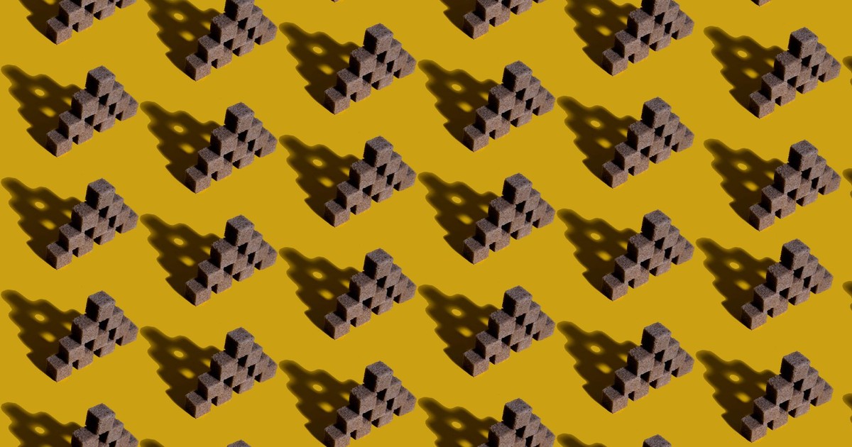 Abstract geometric pattern featuring pyramids creating shadows on a yellow background.