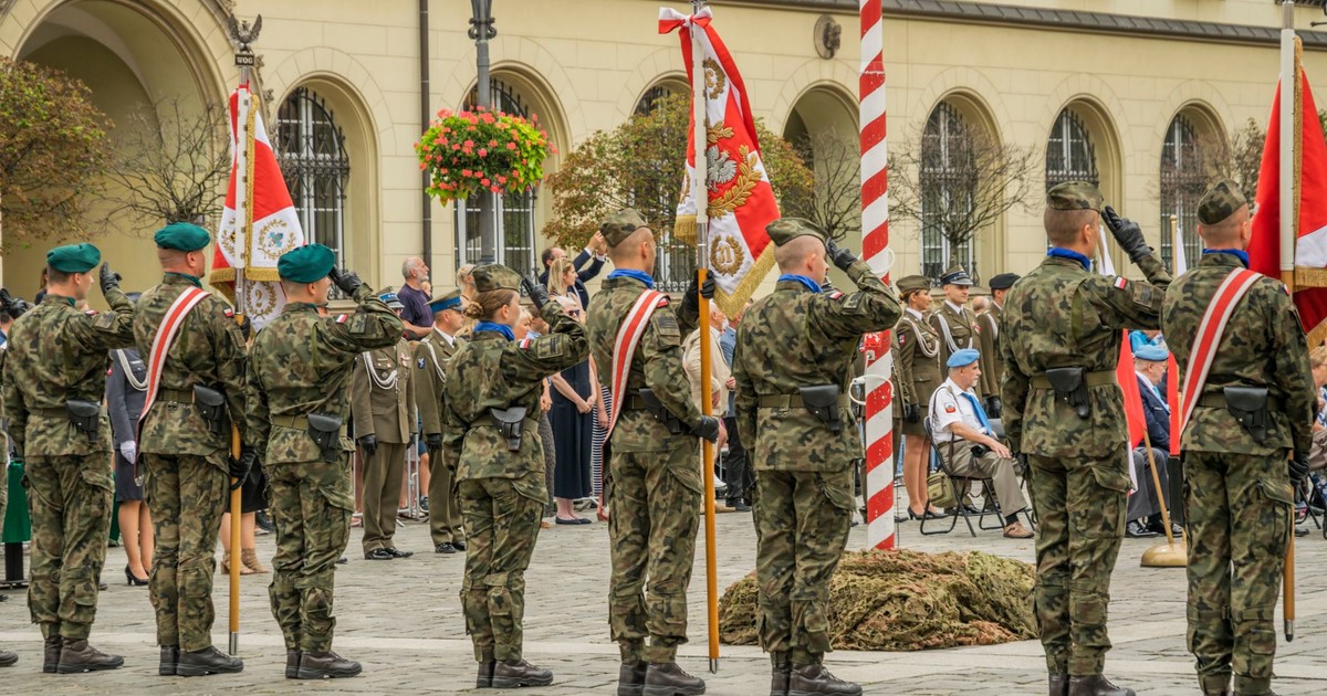 Polish soldiers in military uniforms at a formal parade in Wrocław, showcasing national pride and ceremonial display.