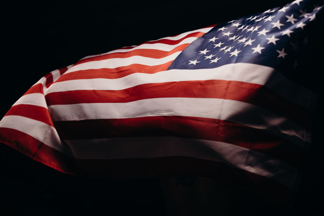 Close-up of a wind-blown American flag symbolizing freedom and patriotism