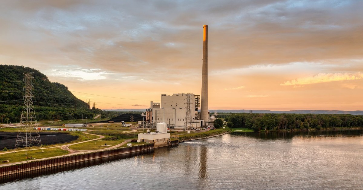 Scenic view of a power station next to a river at sunset in Alma, WI.