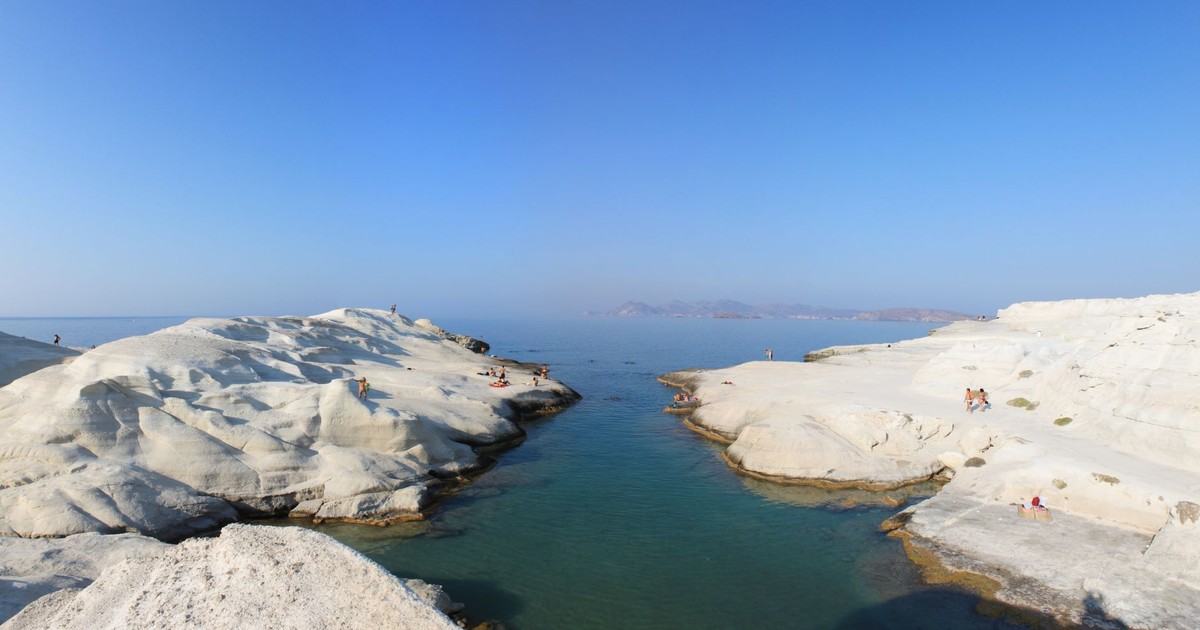 Stunning view of Sarakiniko Beach's unique white rock formations in Milos, Greece.
