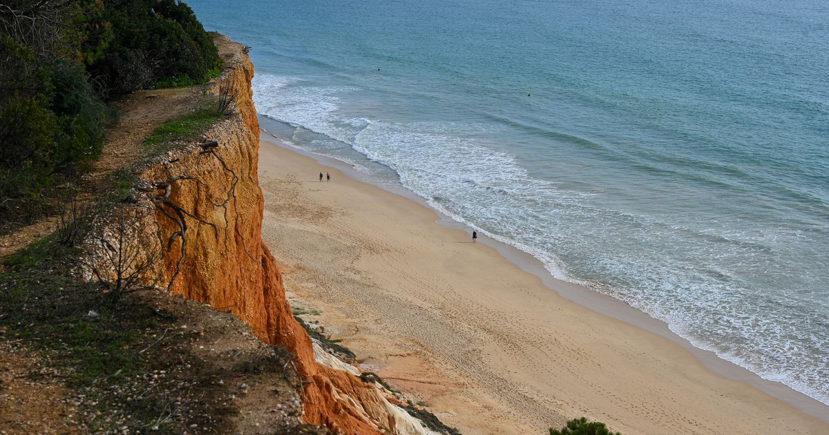 Dramatic cliffs overlooking the beautiful beaches of Faro, Portugal.