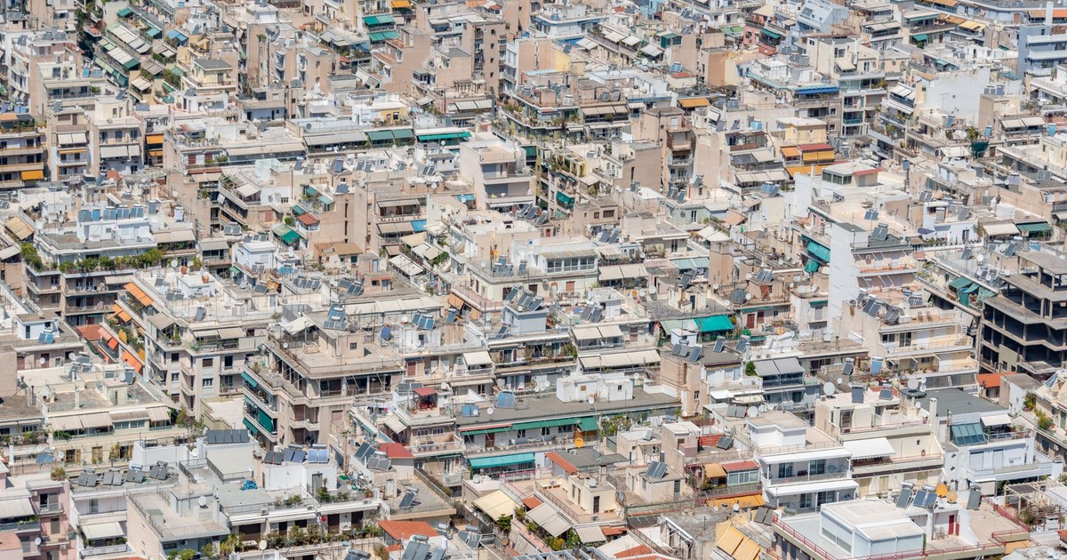 High-angle aerial view showcasing the dense architecture of a bustling cityscape.